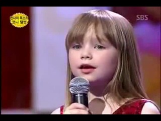 the girl coolly sings the song whitney houston - i will always love you