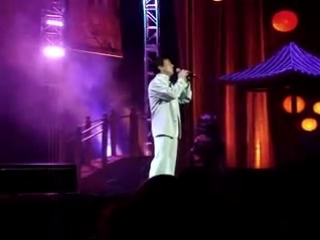 jackie chan sings a song from the movie myth live